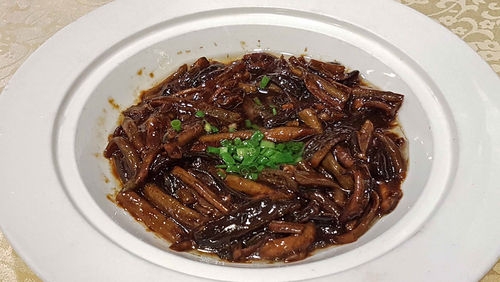 Eel eating Shanghai China.jpg