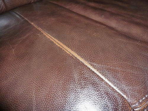 Worn leather damaged-01.jpg